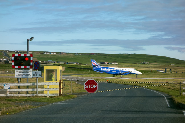 Plane crossing the road at Sumburgh airport, Sumburgh, Shetland